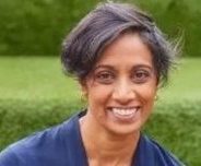 Headshot image of Lisa Patel in dark blue top